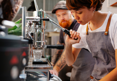 Young person working in a cafe